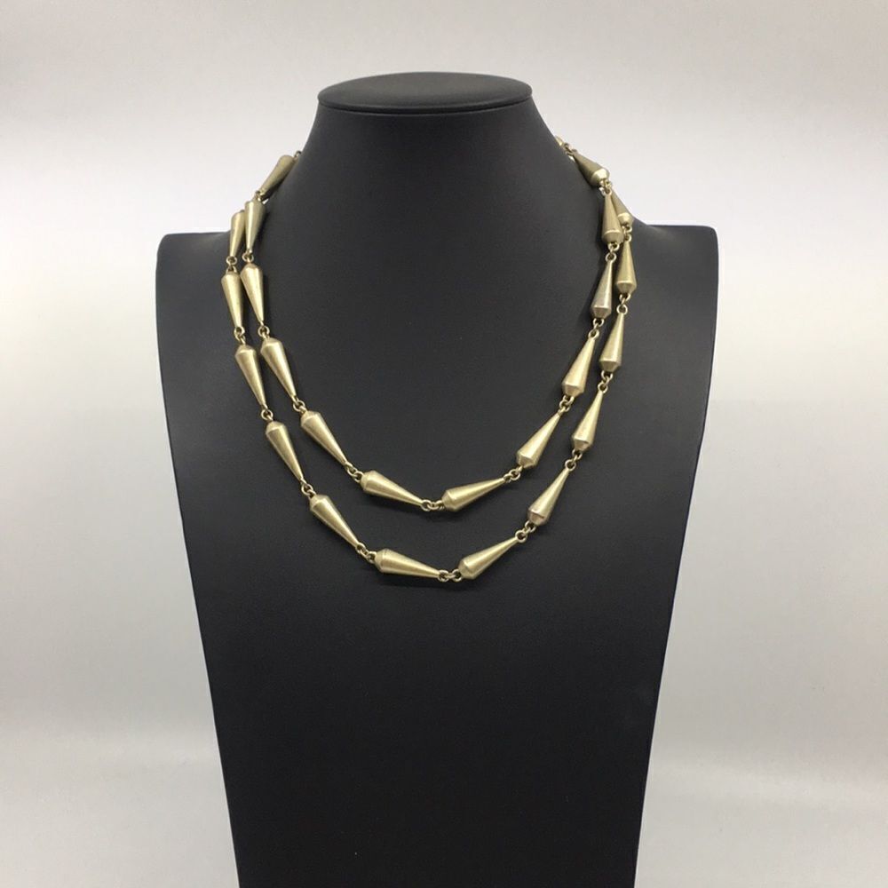 Lia Sophia Retired Rumor long antiqued brass gold tone matte cone necklace
